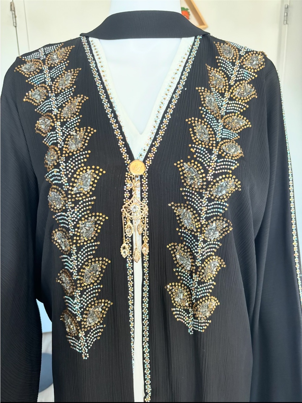 Embellished Black Women’s V-Neck Top with Gold Accents